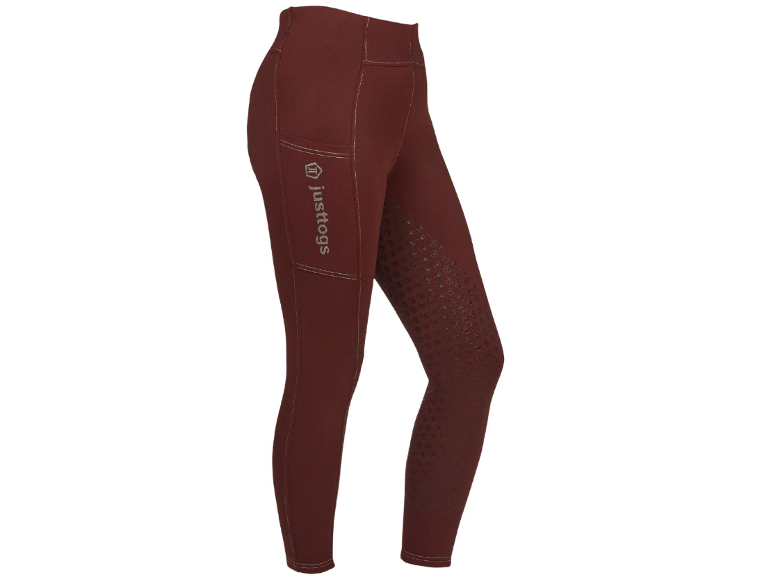 A pair of burgundy equestrian riding tights with textured grip panels on the inner thighs and a white Justlegs logo on the side, shown against a plain white background.