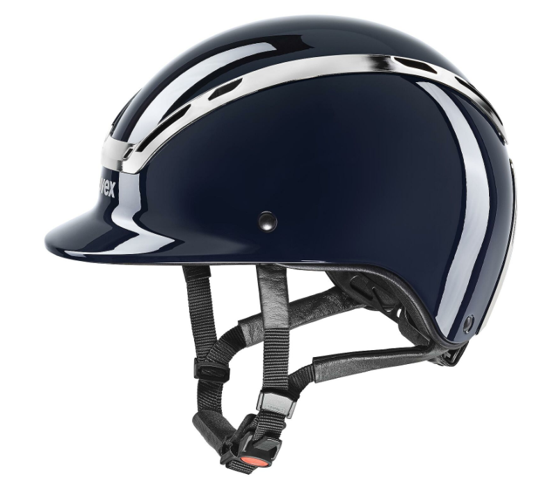 A glossy navy blue equestrian riding helmet with a prominent silver stripe, black chin straps, and a small white 'Trixie' brand logo on the side, shown against a plain white background.