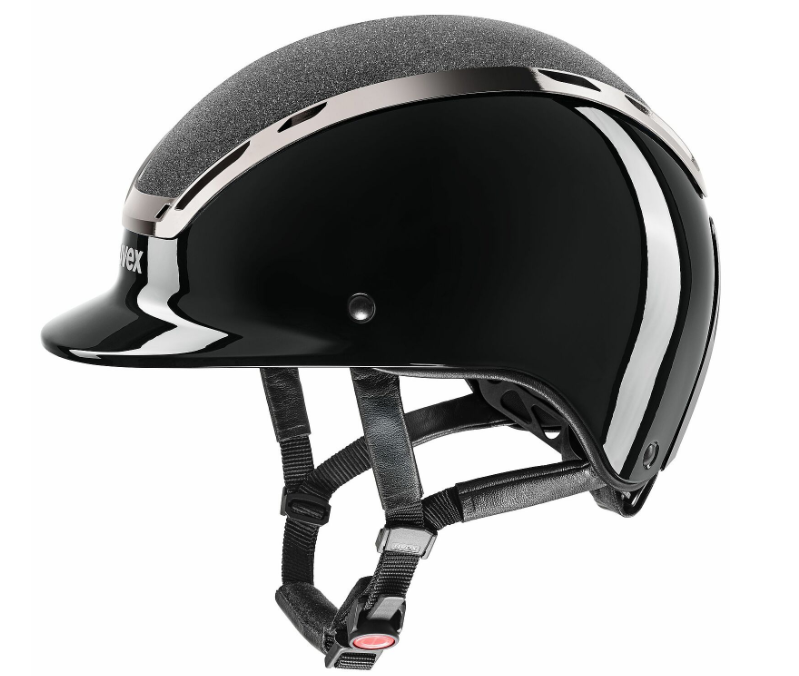 Black shiny horse riding helmet, with straps shown on a white background